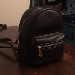 Black leather backpack purse. Perfect size